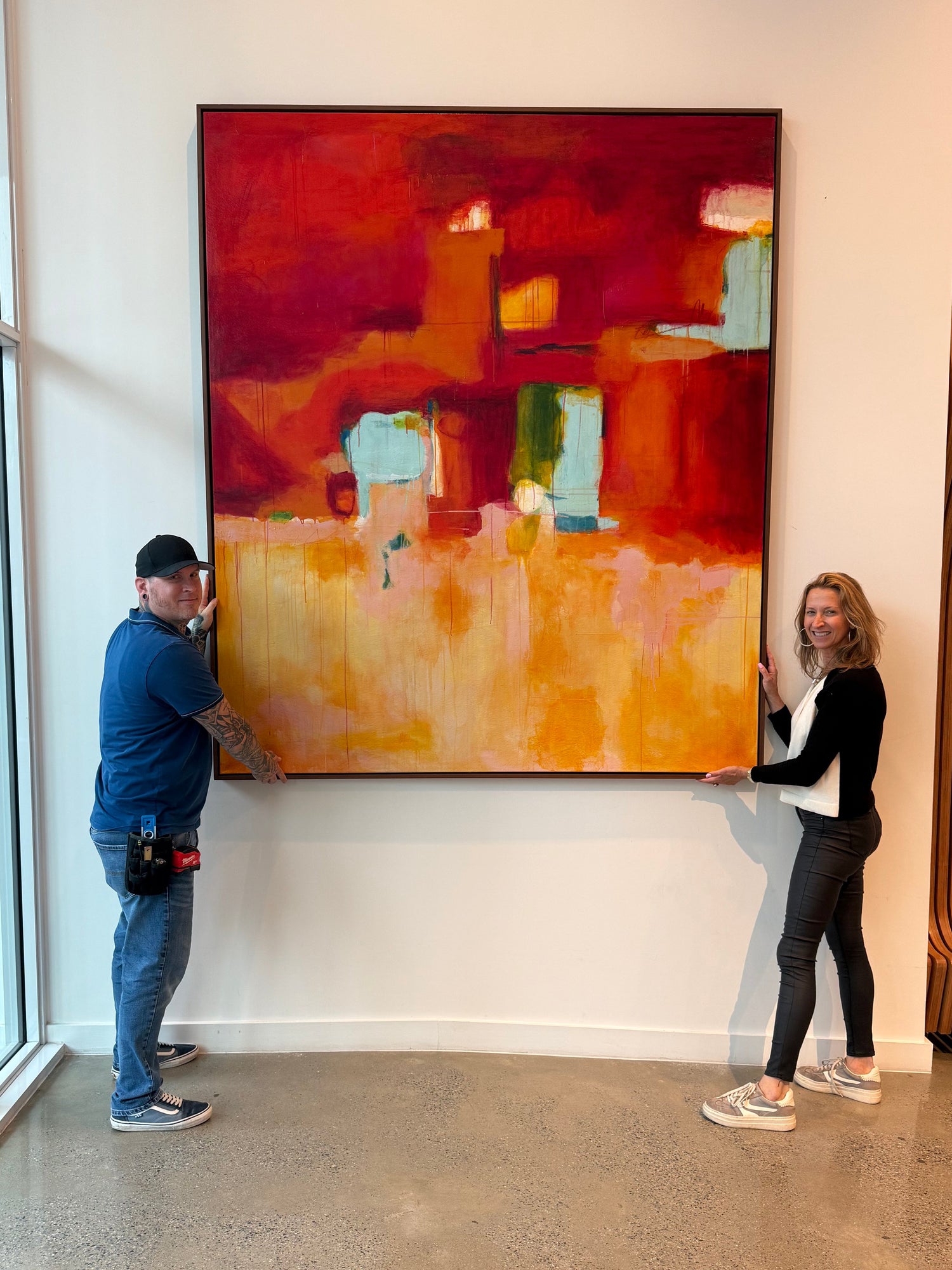 Morton Art Advisory installing a large abstract oil painting for a client collection